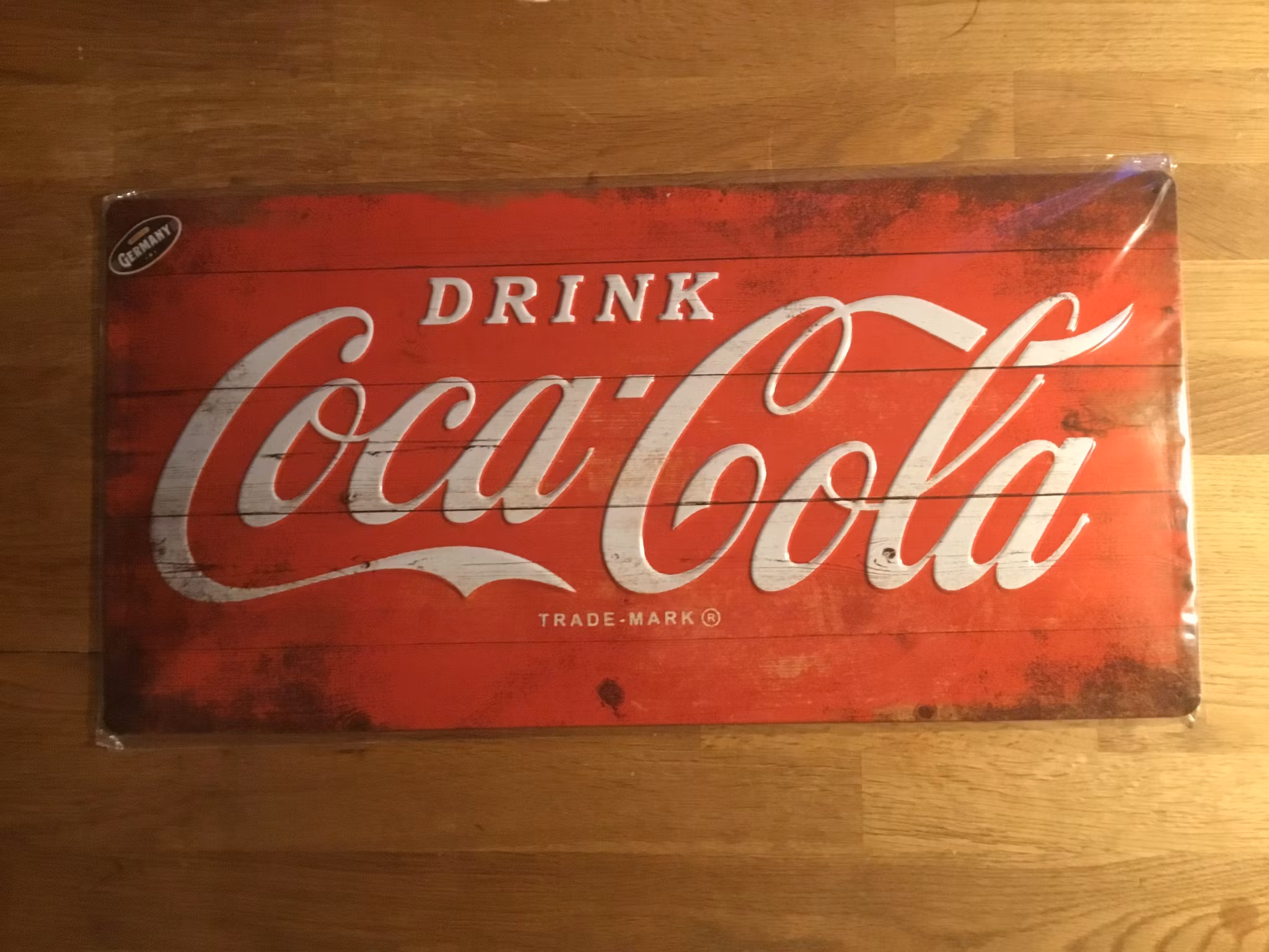 Plåtskylt Coca Cola