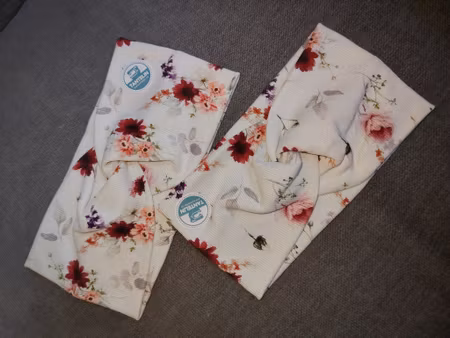 Bomullspannebånd twist blomster rød