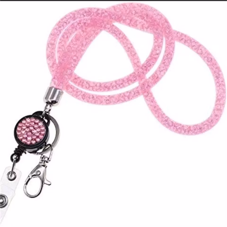 Nummerlappshållare i nylon med bling rosa