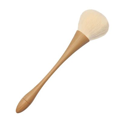Puderborste med trähandtag