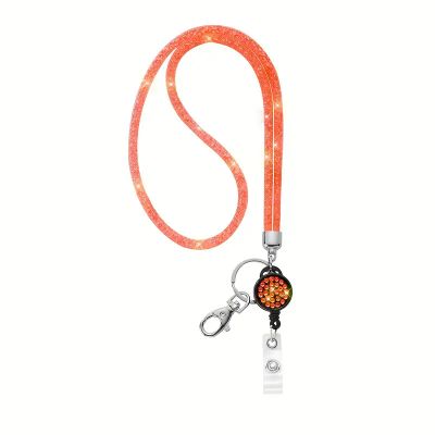 Nummerlappshållare i nylon med bling orange/mandarin