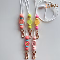 BADGE KEY NECKLACE POPPY starburst