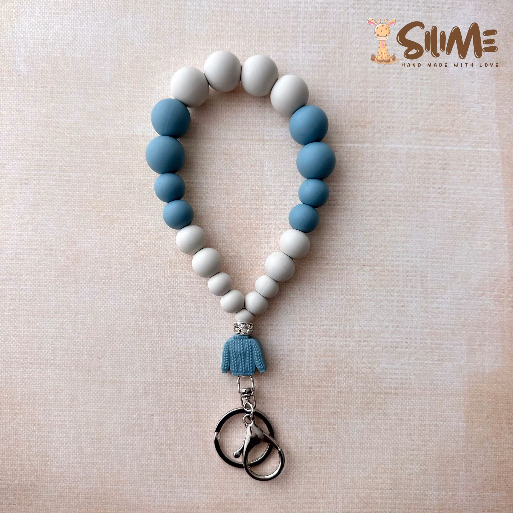 KEY BRACELET SWEATER