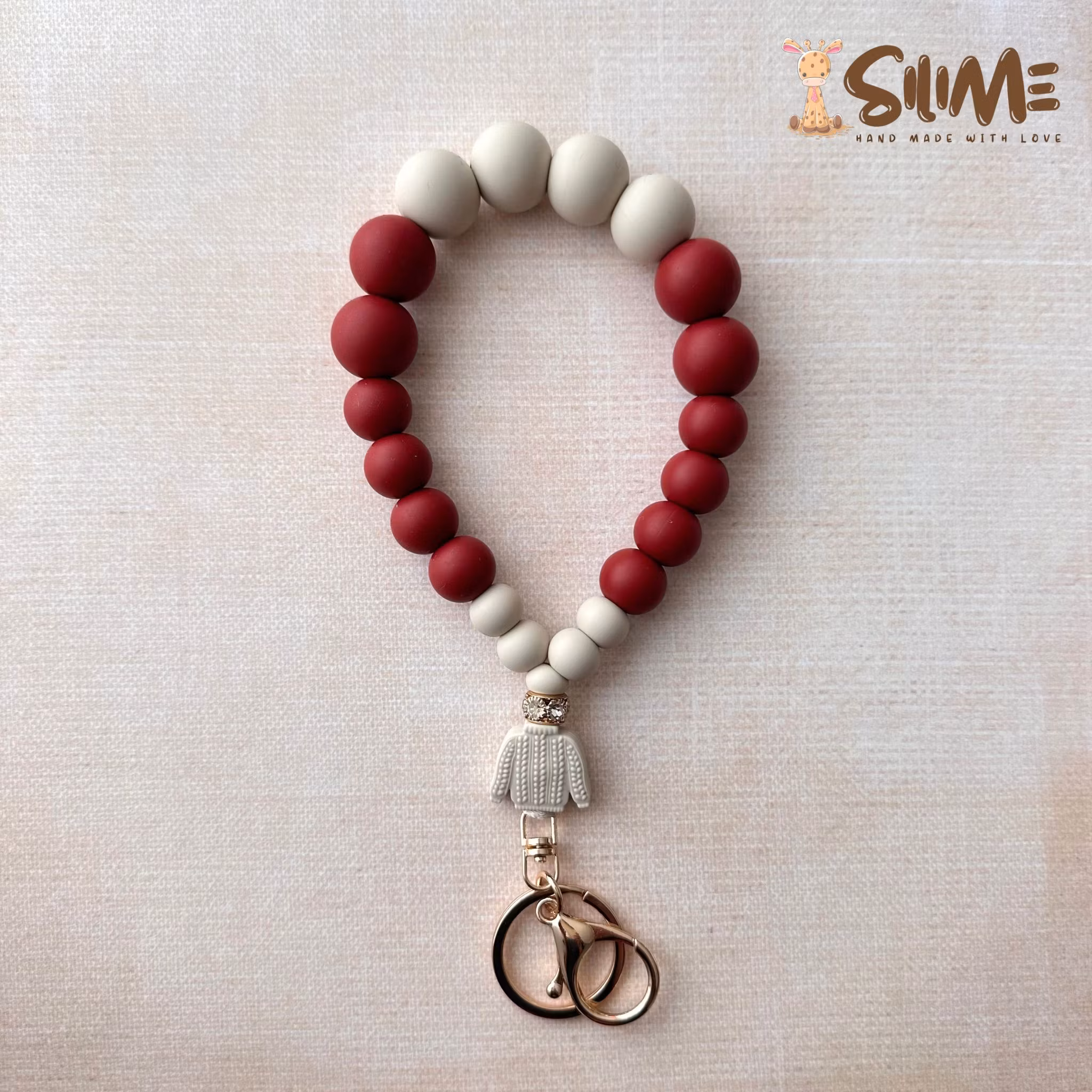 KEY BRACELET SWEATER