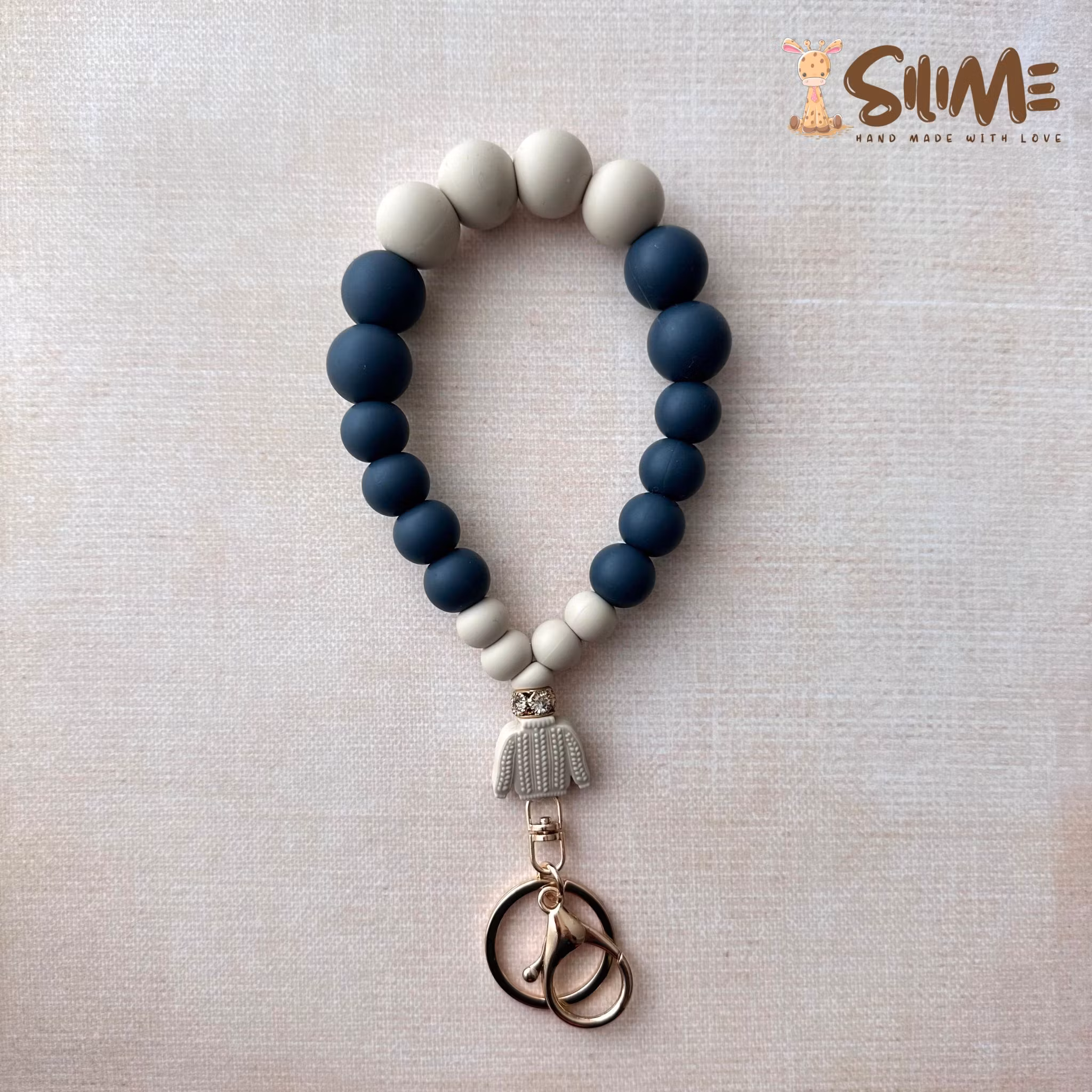 KEY BRACELET SWEATER