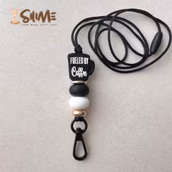 BADGE-NYCKEL HALSBAND fueled by Coffe svart