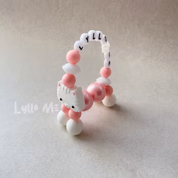 ARMBAND Twist a pet med NAMN White/Pink