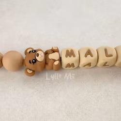 Pacifier holder with name NALLE Light Brown /WHEAT