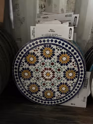 Gula blommor med blå kant mosaik bord