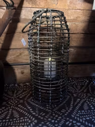 Ljuslykta i lindad pil
