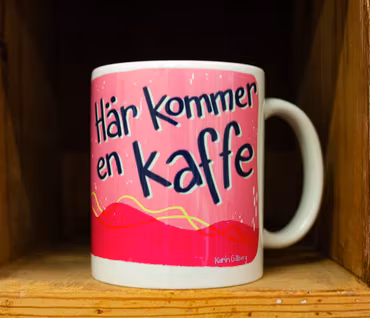 Kaffemugg med fågel