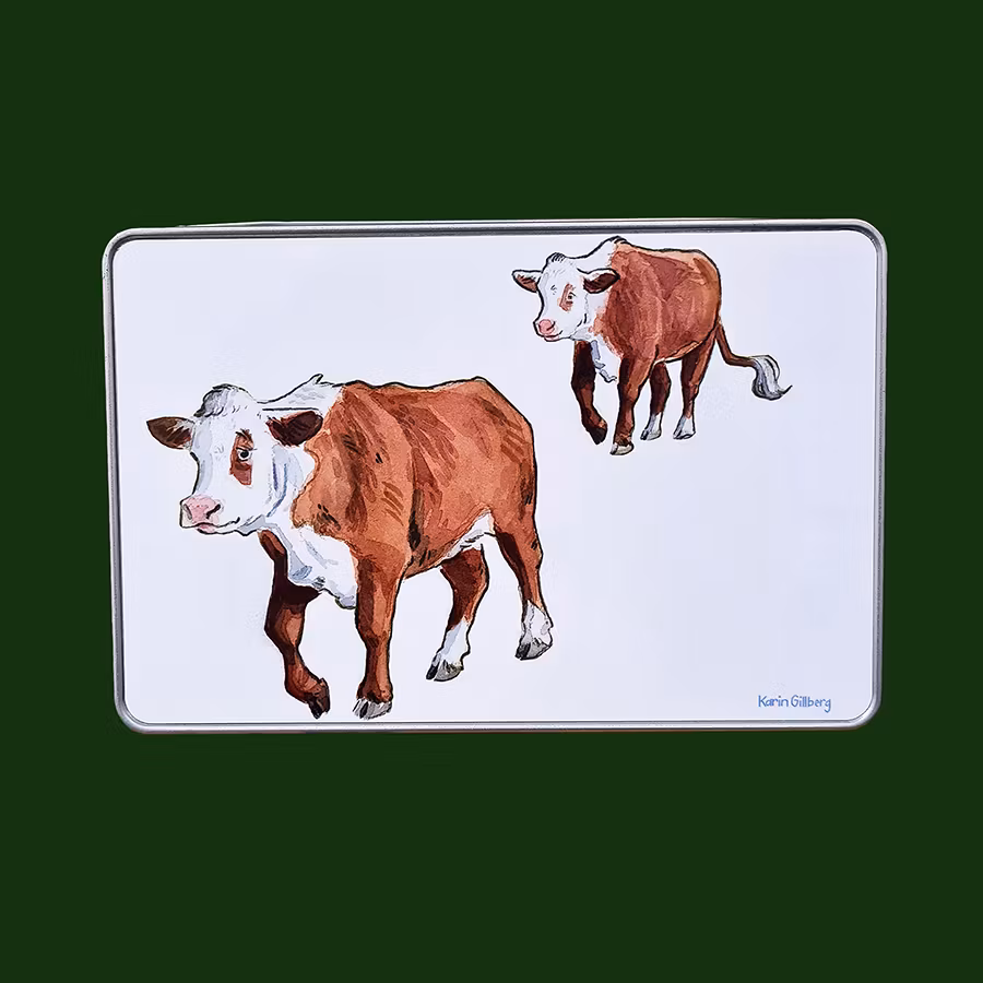 En söt burk med två kor.