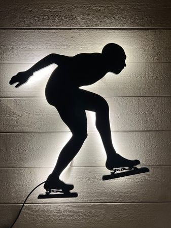 Vägglampa Skridskor