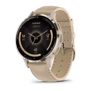 Garmin Venu® 3S Ramme i rustfritt stål og fargen Soft Gold med urkasse, skinnrem i fargen French Gray og ekstra gummirem