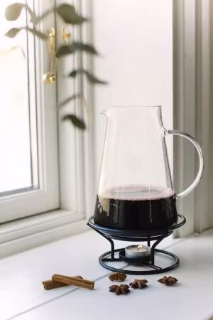 Snöstjärna Glöggkaraff glas svart smidesställning snöstjärna