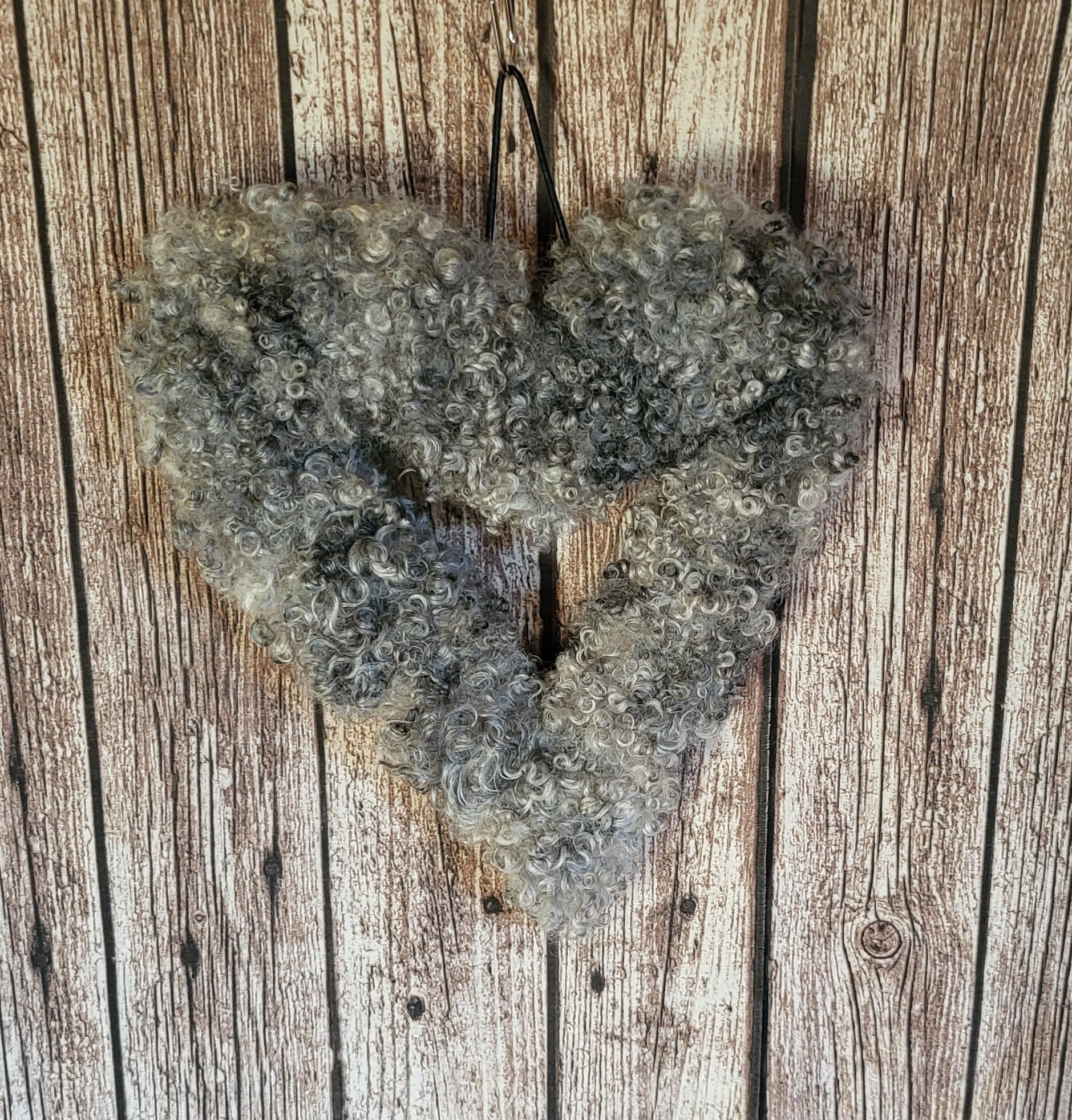 Hjärta, litet utan belysning. Grå.