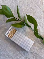 Tändstickor grå rutig