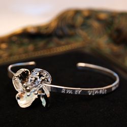 Armband blomma
