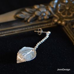 Örhänge med litet rosenblad