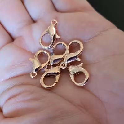 765 Klo lås 14mm mjukt guld 50stk