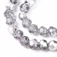 3469 Glaspärla fasett rund halvförsilvrad 6mm silver