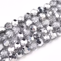 3469 Glaspärla fasett rund halvförsilvrad 6mm silver
