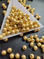 165  Stardust guldig 6mm 30 stk