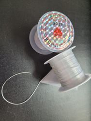 54 Elastisk platt fibertråd vit