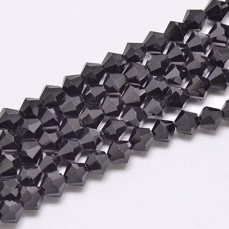 1410 Glaspärlor bicones 4mm på sträng svart