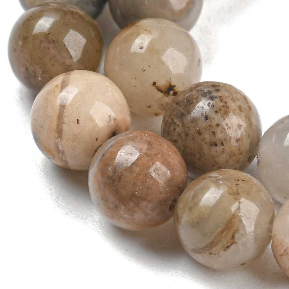1820 Rhodonit 6mm på sträng