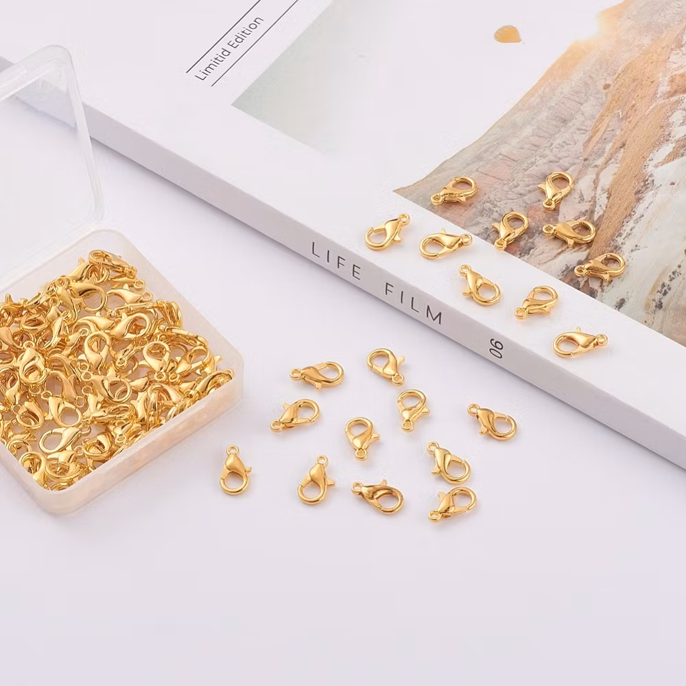 765 Klolås mjukt guld 14mm 50stk