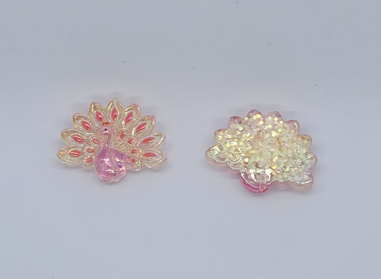 3207 Påfågel rosa med hål