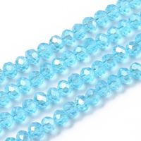 B14 glaspärla fasetterad rondell 4x3mm cyan