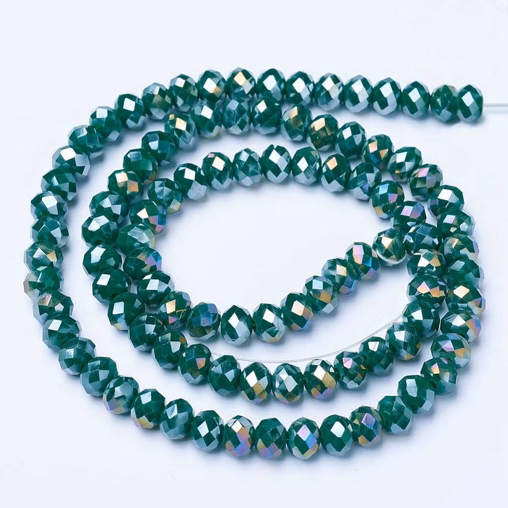 3316 Glaspärla fasett rondell 6x5mm mörkgrön electro