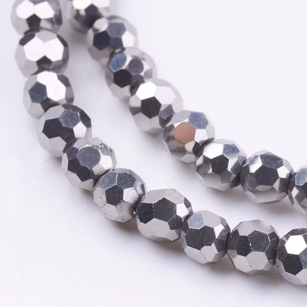 3354 glaspärla fasett rund 4mm försilvrad