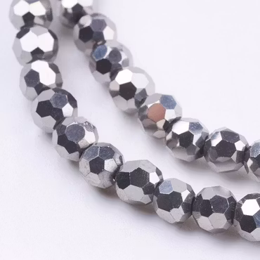 3354 glaspärla fasett rund 4mm försilvrad