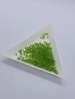 Toho 11/0 ( 77 ) crystal color lined grön irislyster  40gram  bilder kommer