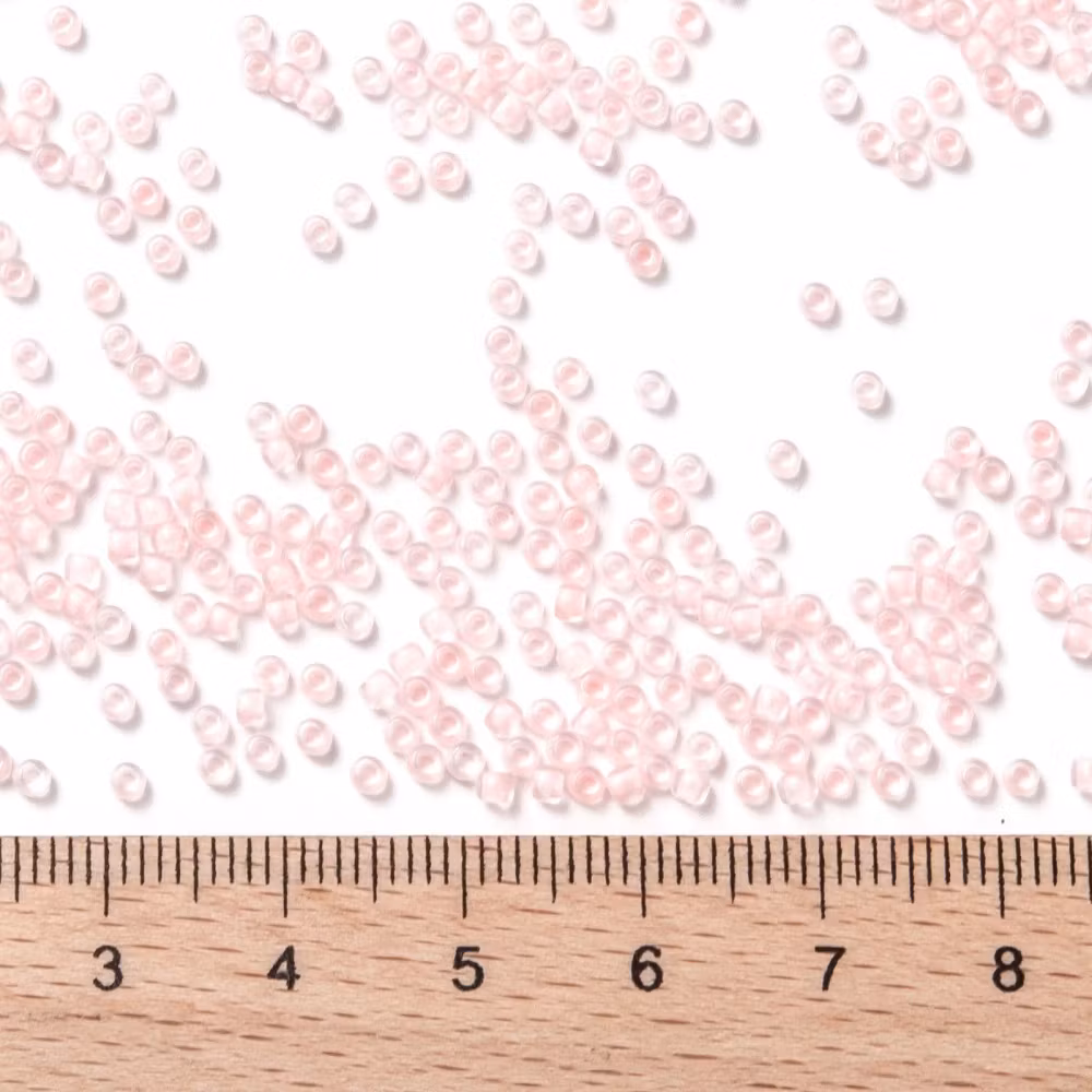 Toho 11/0 ( 967 ) inside color crystal/neon rosaline lined 11/0, 10gram