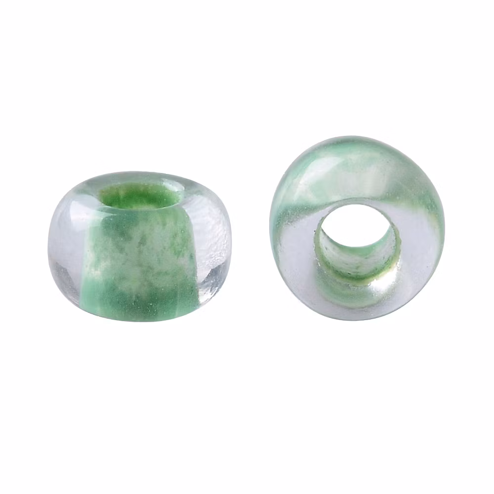 Toho 11/0 ( 975 ) inside color crystal/neon sea foame lined 11/0, 10gram