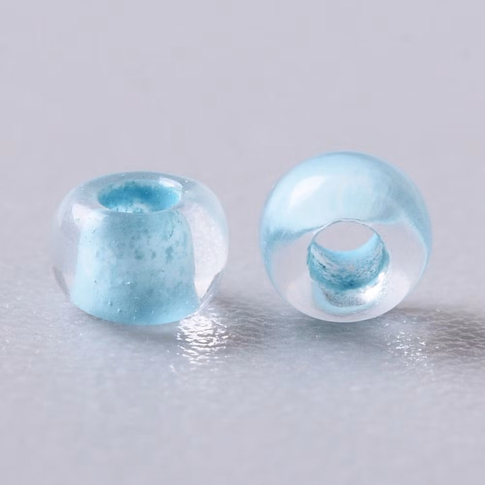 Toho 11/0 ( 976 ) inside color crystal/ice blue lined 11/0, 10gram