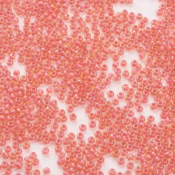 Toho 11/0 ( 979 ) transparent Ljustopas/Neonrosa lined 11/0, 10gram