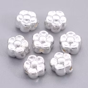 3871 Mellandelspärlor blommor 5x5mm silverpläterade 100stk