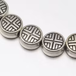 2388 Mellandelspärla rund-platt 6.3mm på sträng