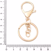 C6 Nyckelring med ring och hänge guld