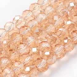 3990 Glaspärla rondell ljusguldgul 3,5x2,5~3mm