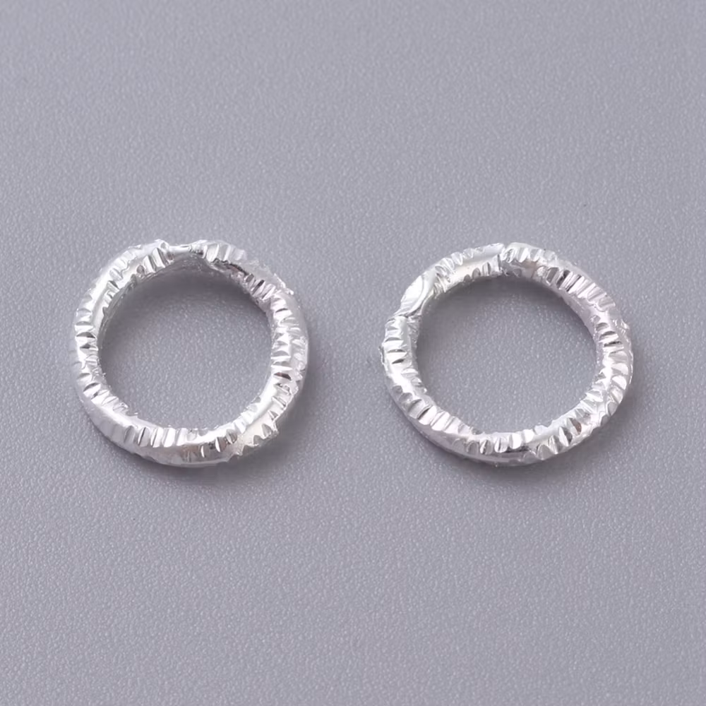 4045 Bindring silver HEL tvinnad 7,5mm 50stk
