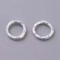 4045 Bindring silver HEL tvinnad 7,5mm 50stk