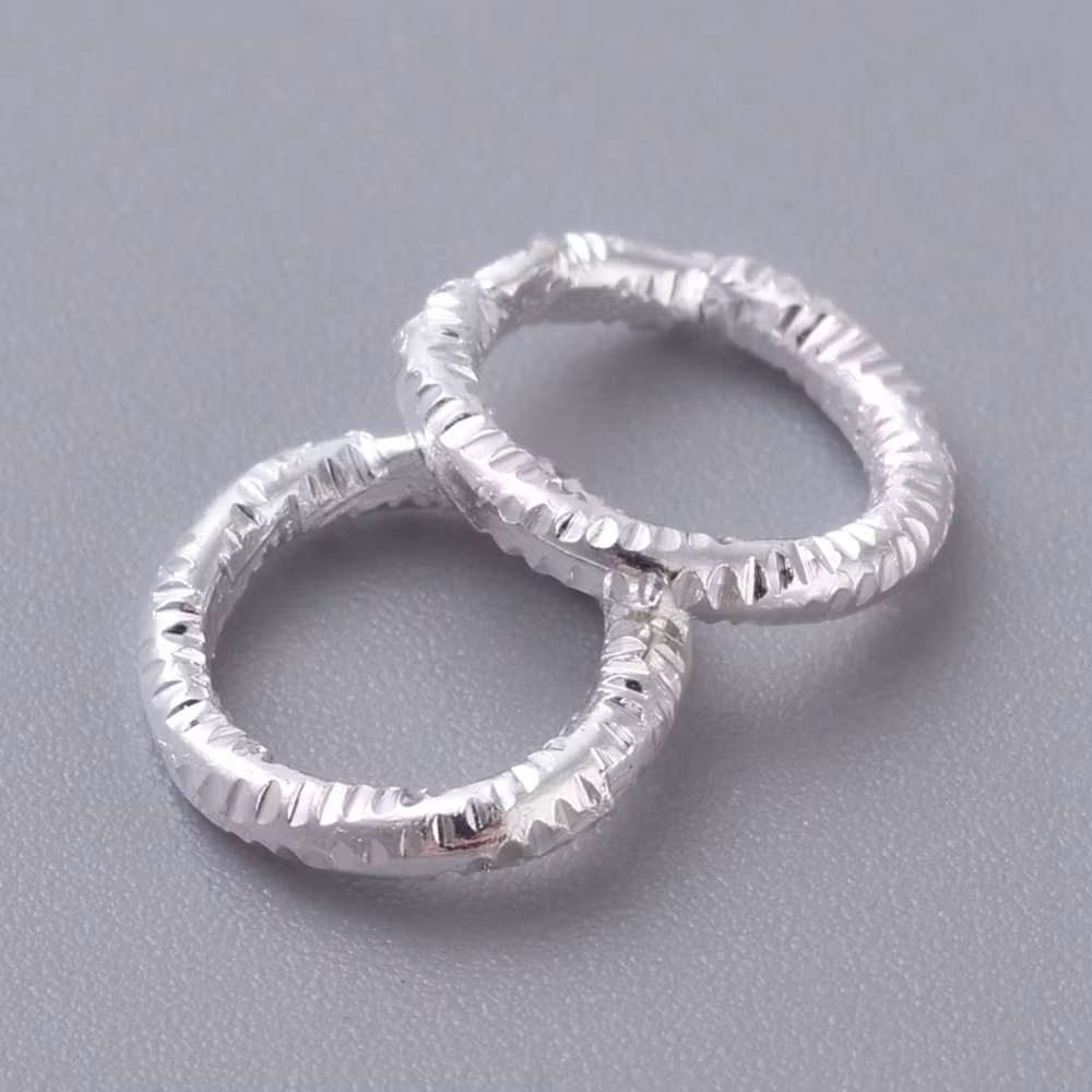 4045 Bindring silver HEL tvinnad 7,5mm 50stk