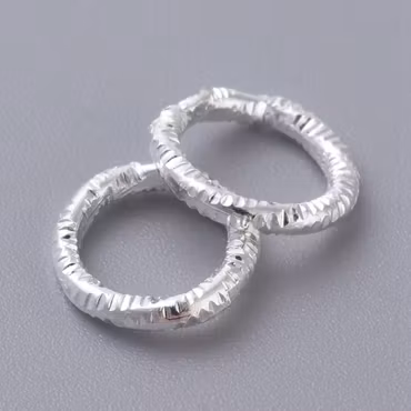 4045 Bindring silver HEL tvinnad 7,5mm 50stk