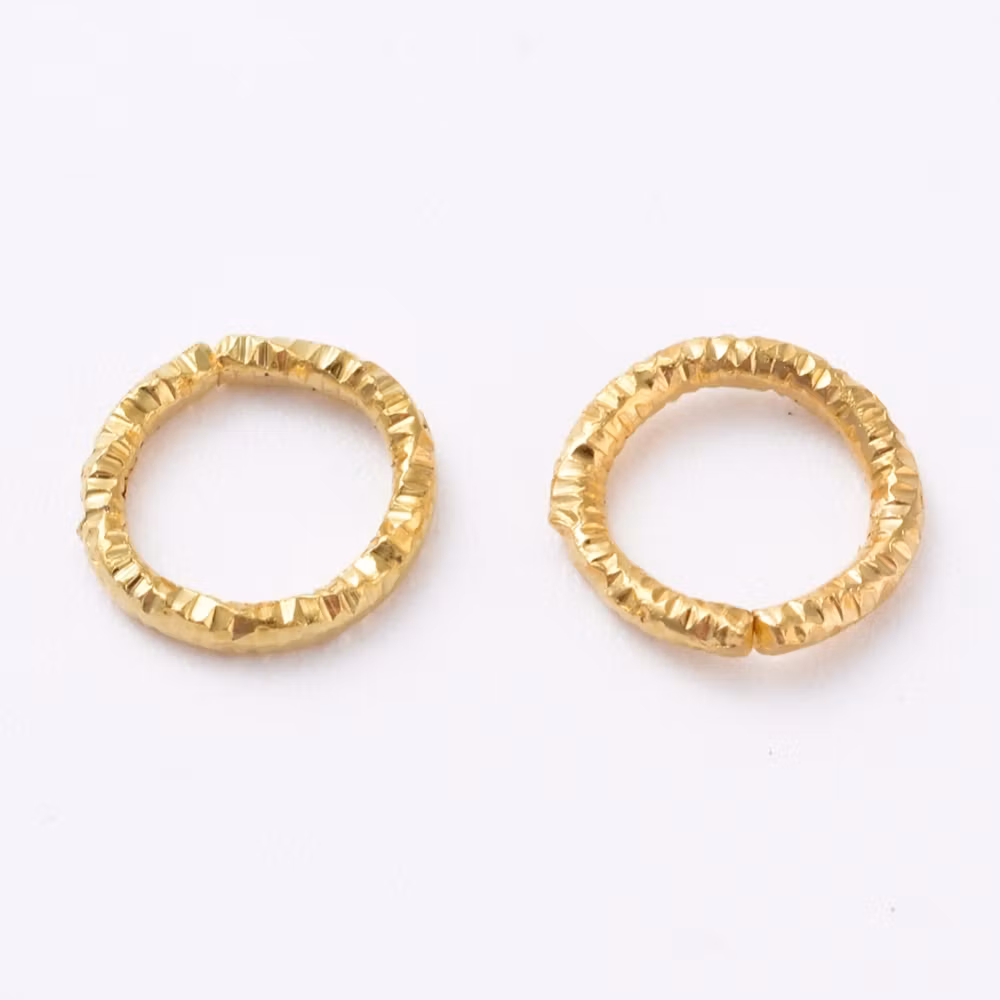 4046 Bindring guld HEL tvinnad 7,5mm 50stk